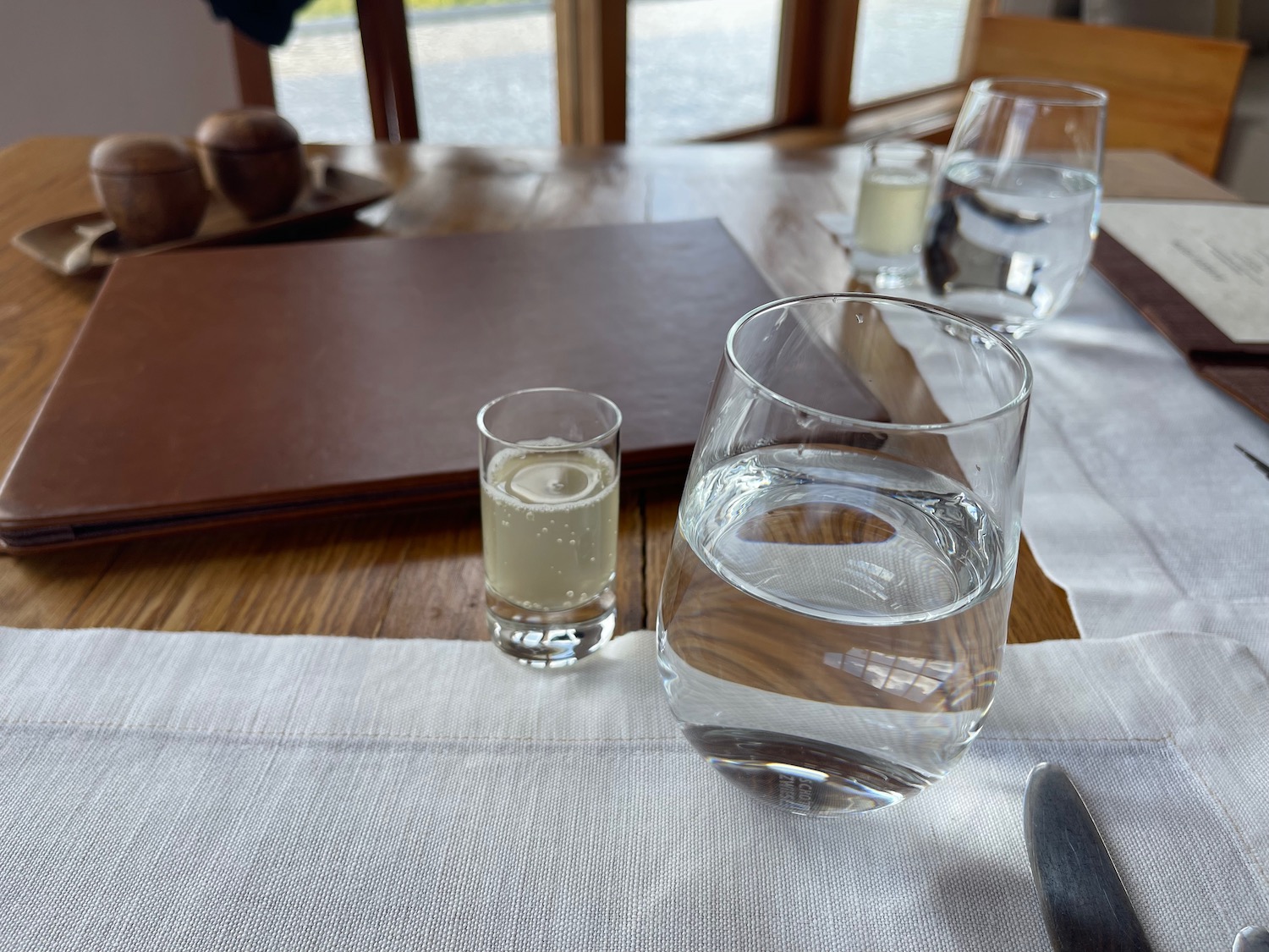 a glass of water on a table