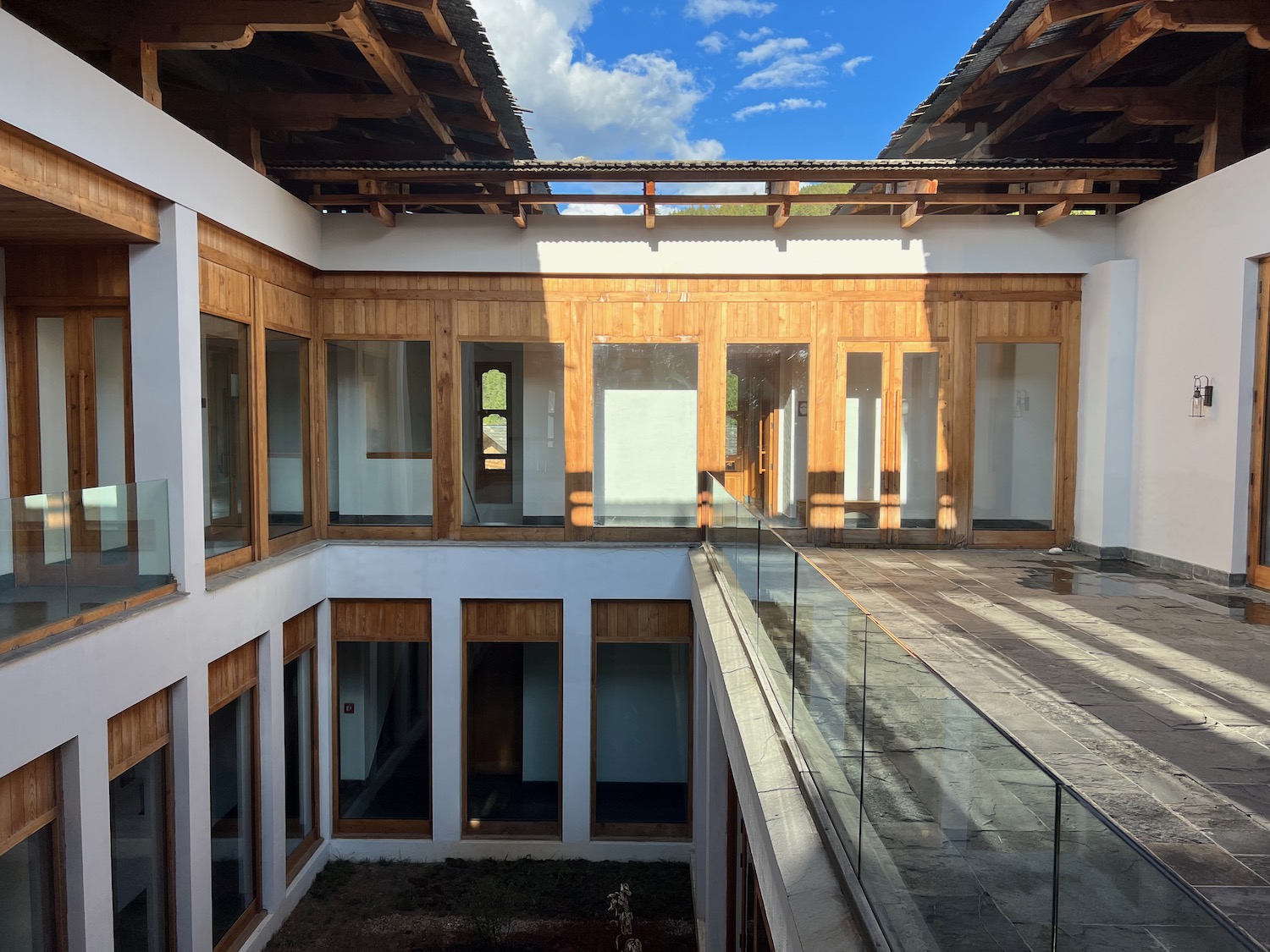 a building with glass walls and a roof