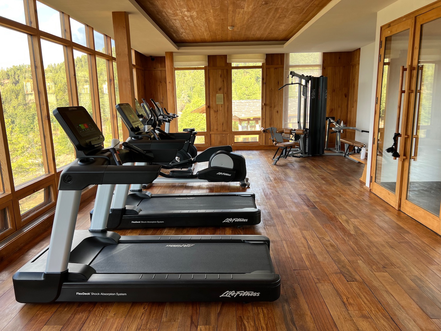 a room with treadmills and exercise equipment