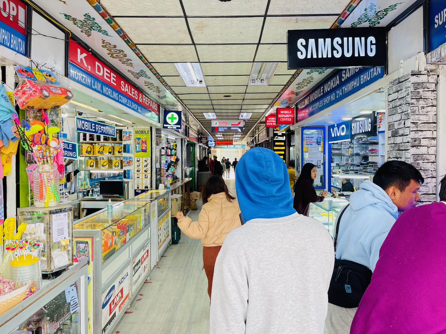 people walking in a store