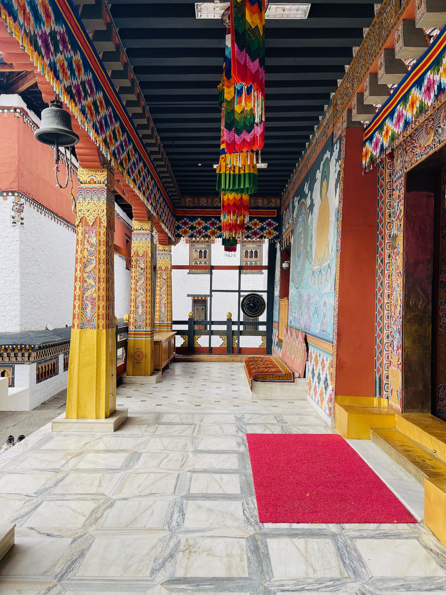 a colorful decorated building with a red carpet