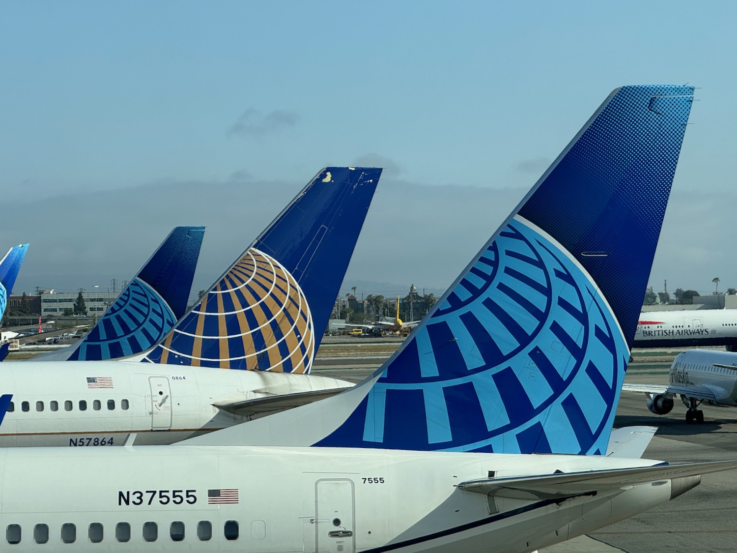 airplanes parked at an airport