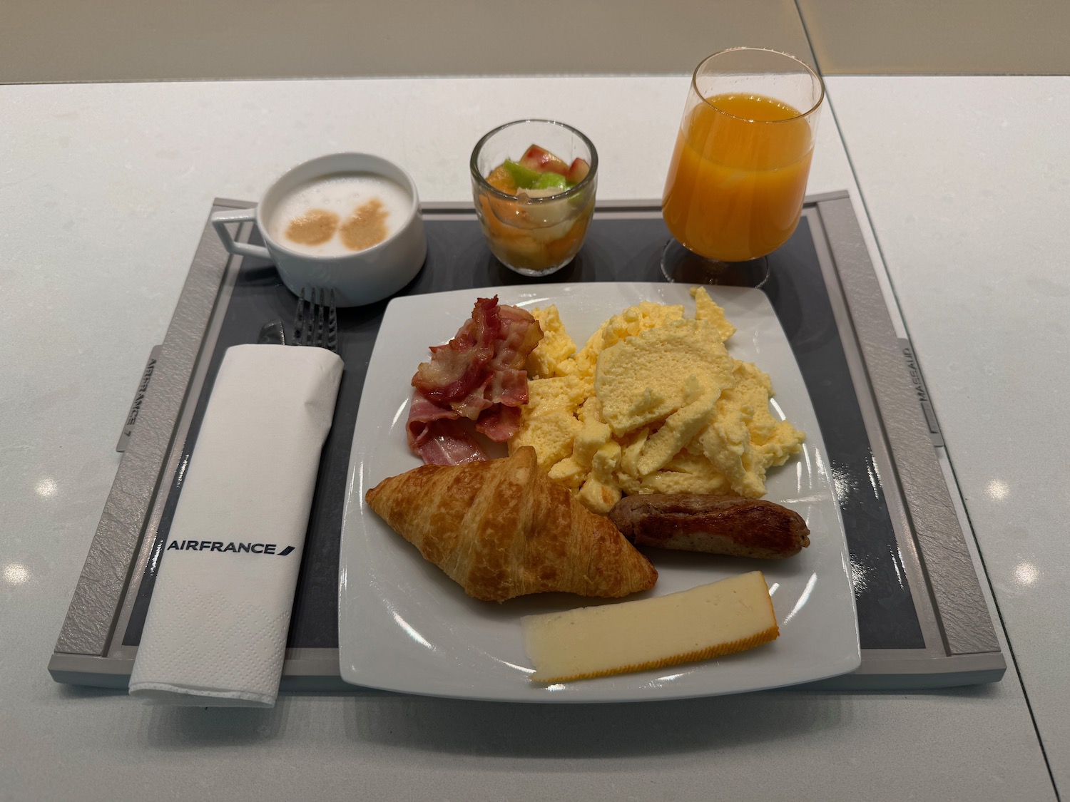 a plate of food on a tray