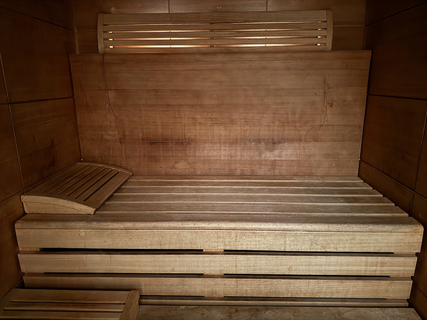 a wooden bench in a sauna