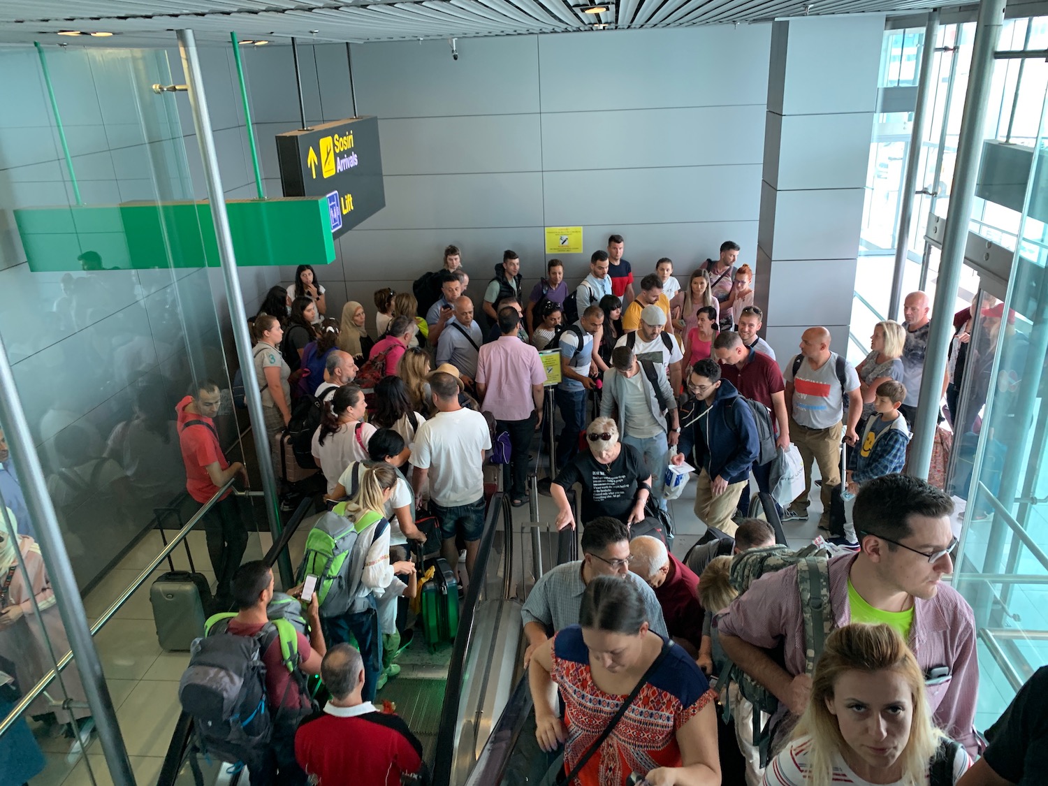 a group of people standing in a building