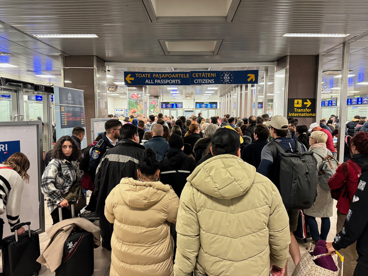 a group of people in a terminal