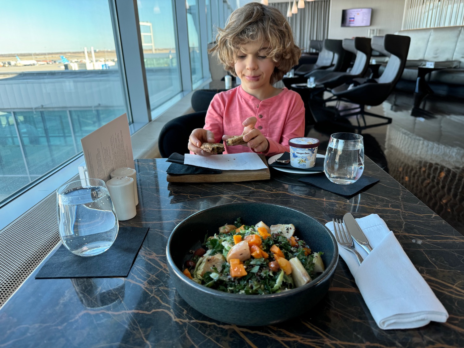 a child eating at a table