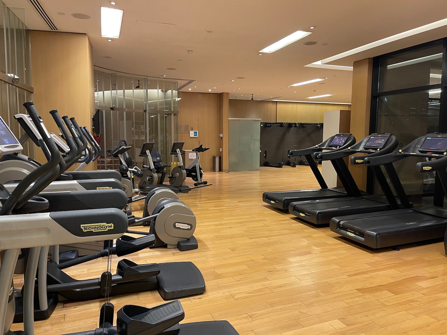 a room with treadmills and exercise machines