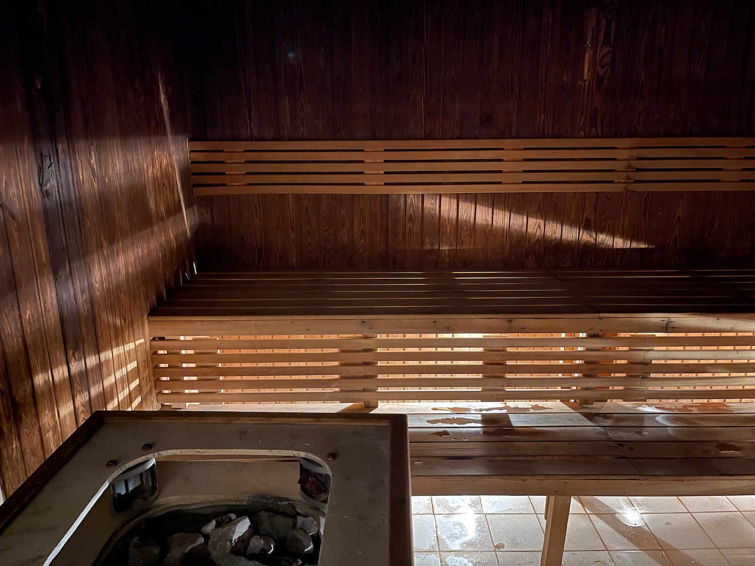 a wooden bench and bench in a sauna