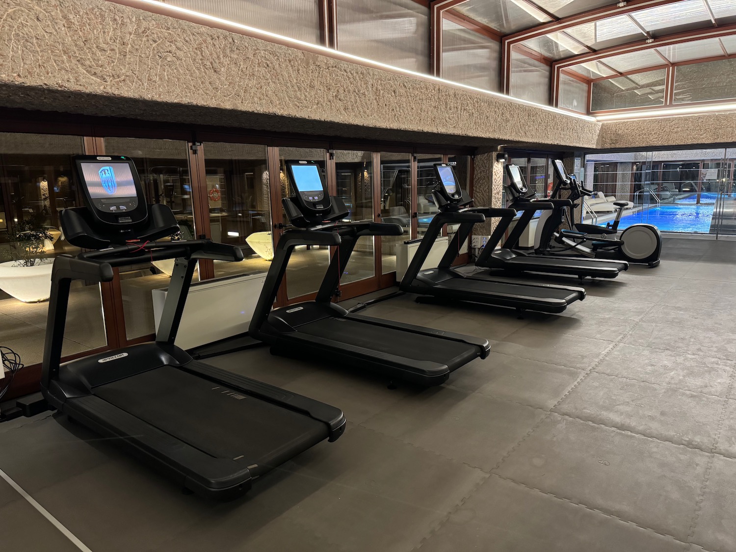 a group of treadmills in a room