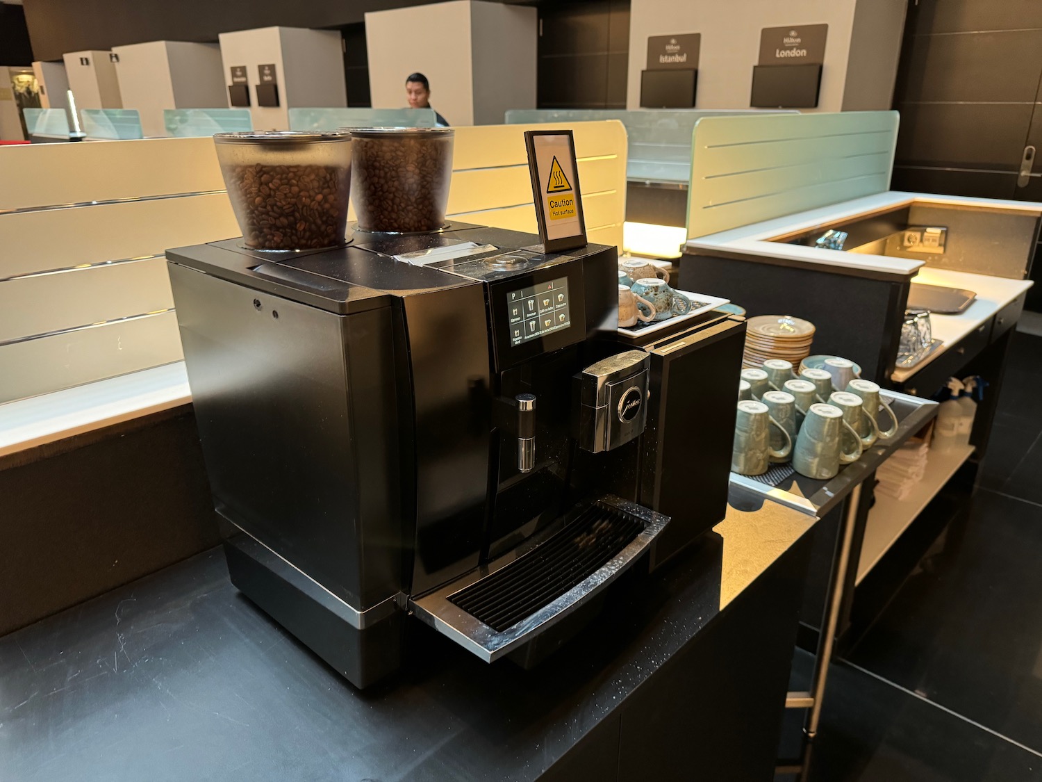 a coffee machine with coffee beans on top