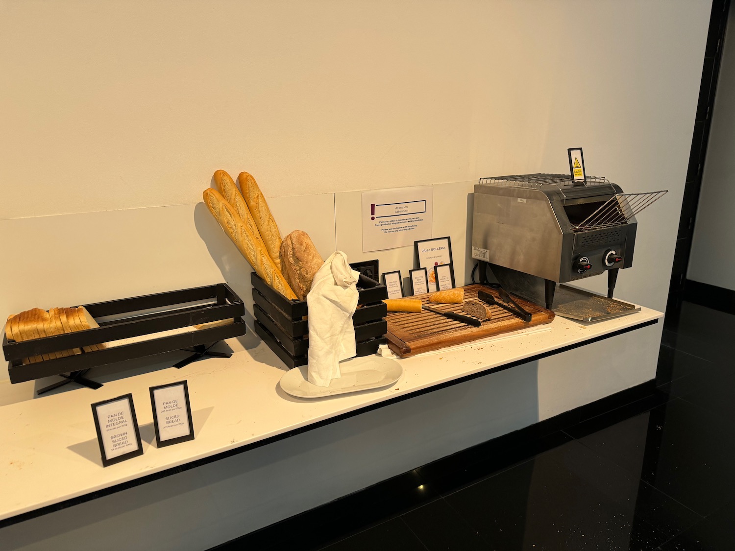 a bread machine and bread on a counter