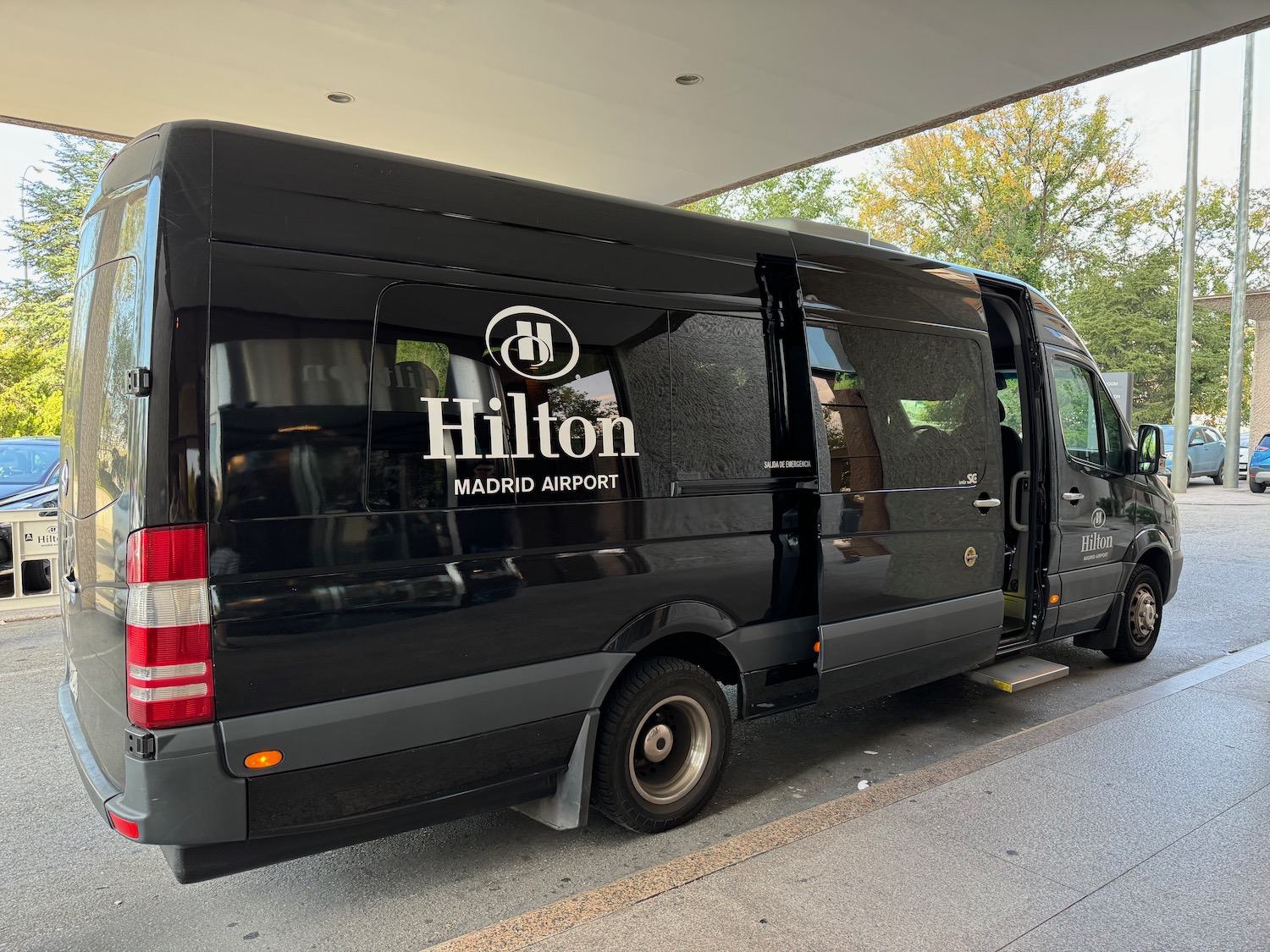 a black van parked in front of a building