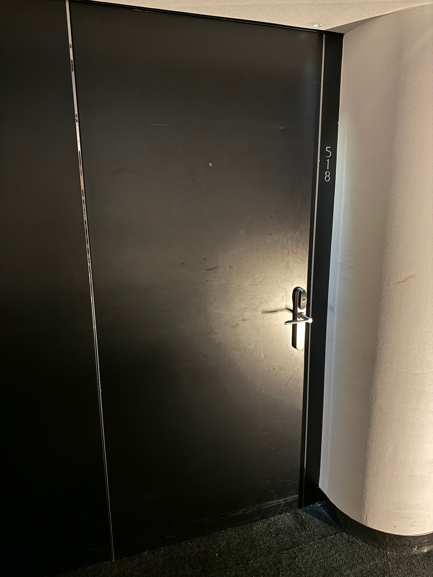 a black door with a handle