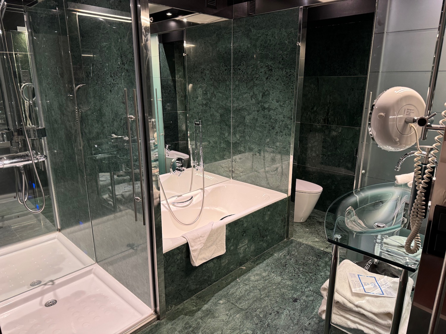 a bathroom with a bathtub and shower