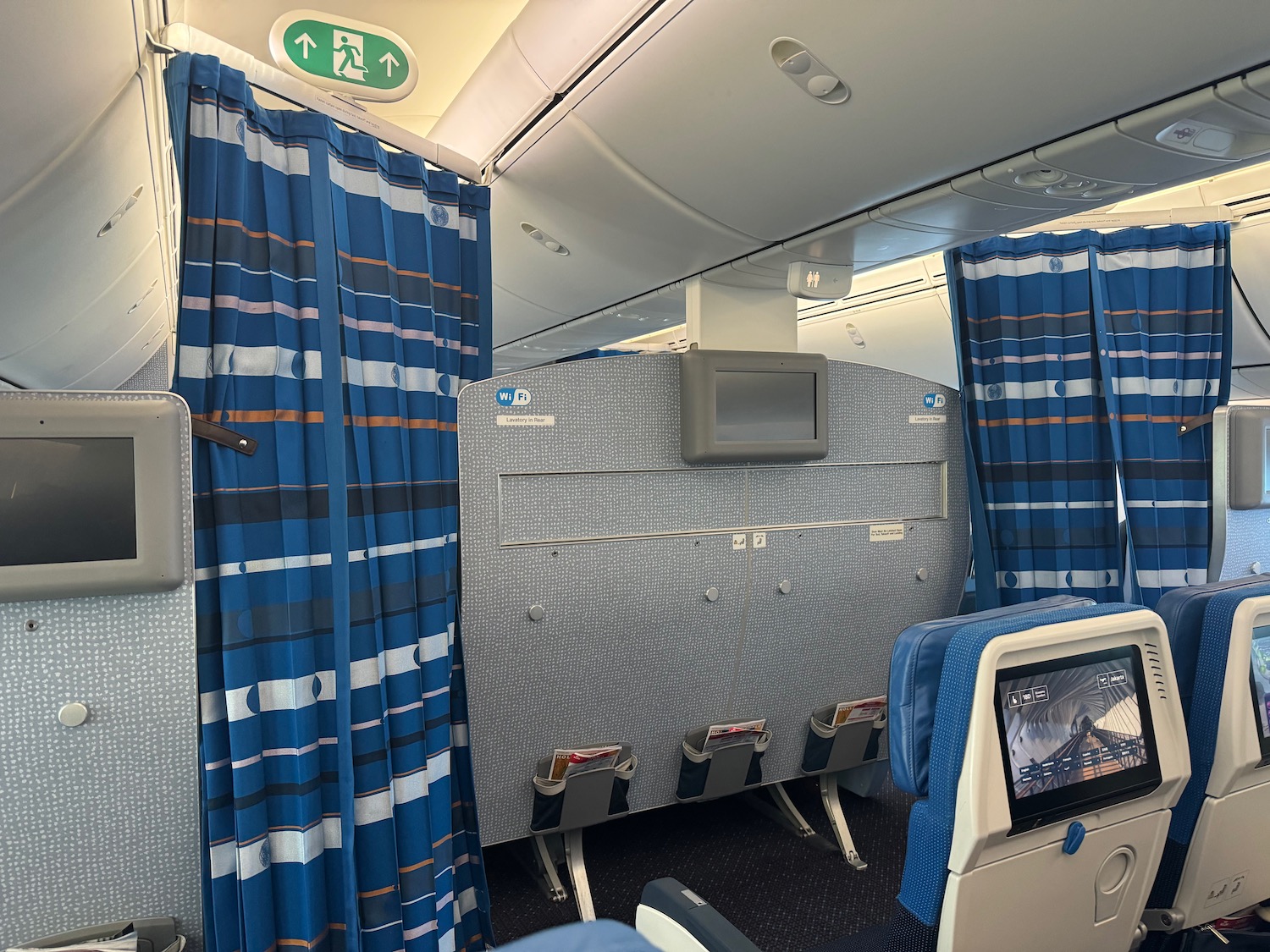 a blue and white curtains in a plane