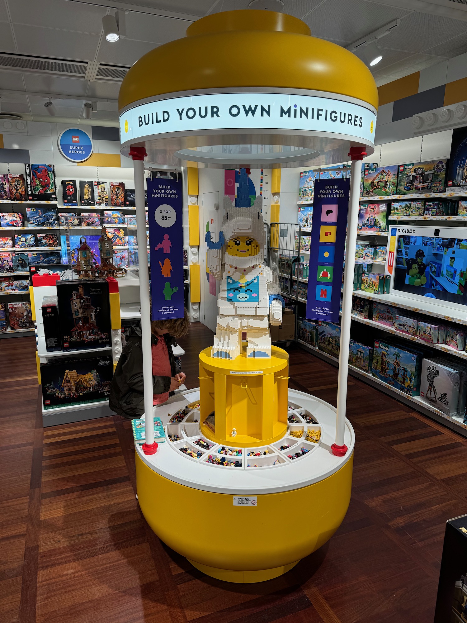 a toy store with a yellow and white display