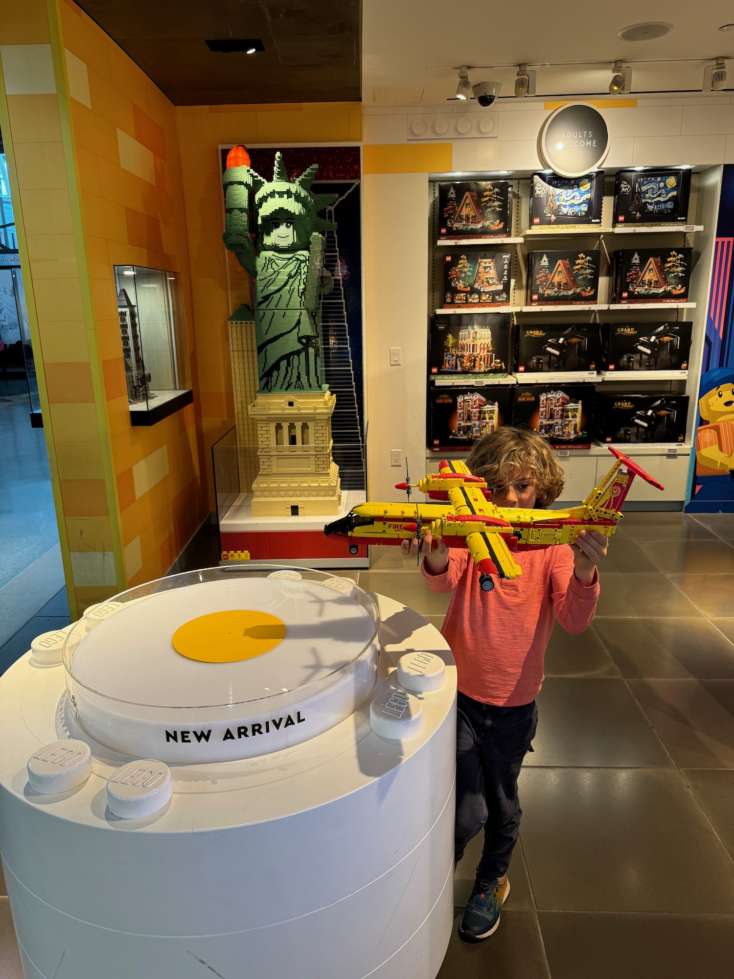 a child holding a toy airplane