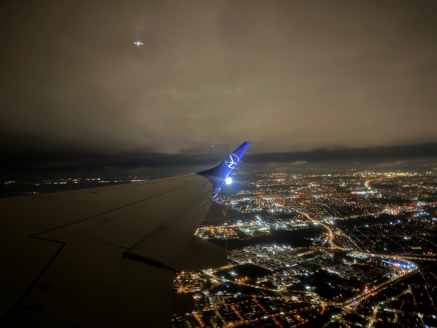 an airplane wing in the sky