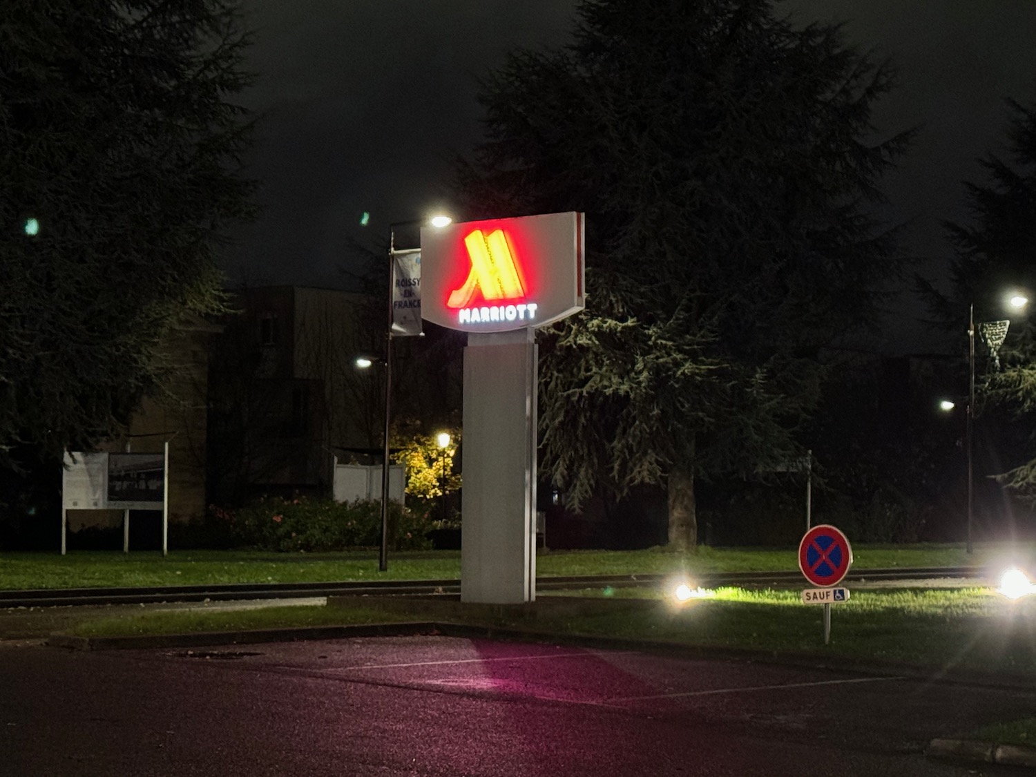 a sign with a red logo