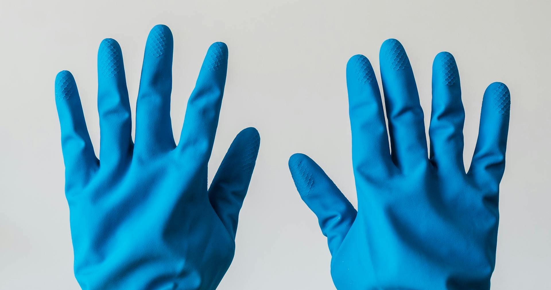 a pair of blue rubber gloves