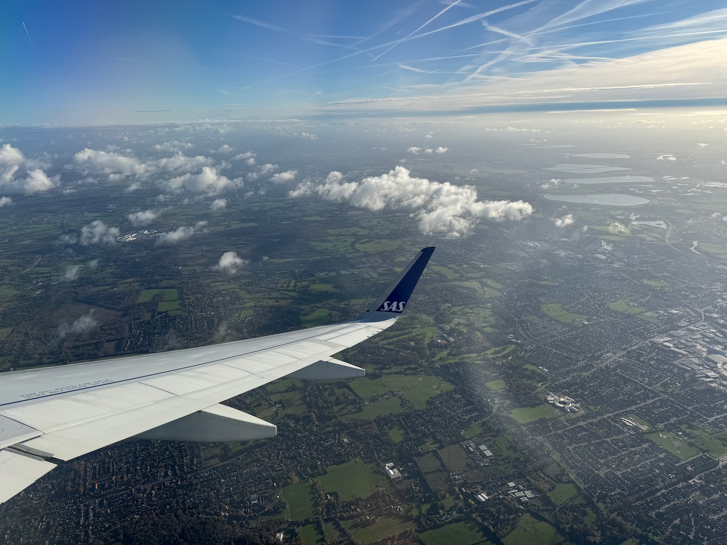 an airplane wing in the sky