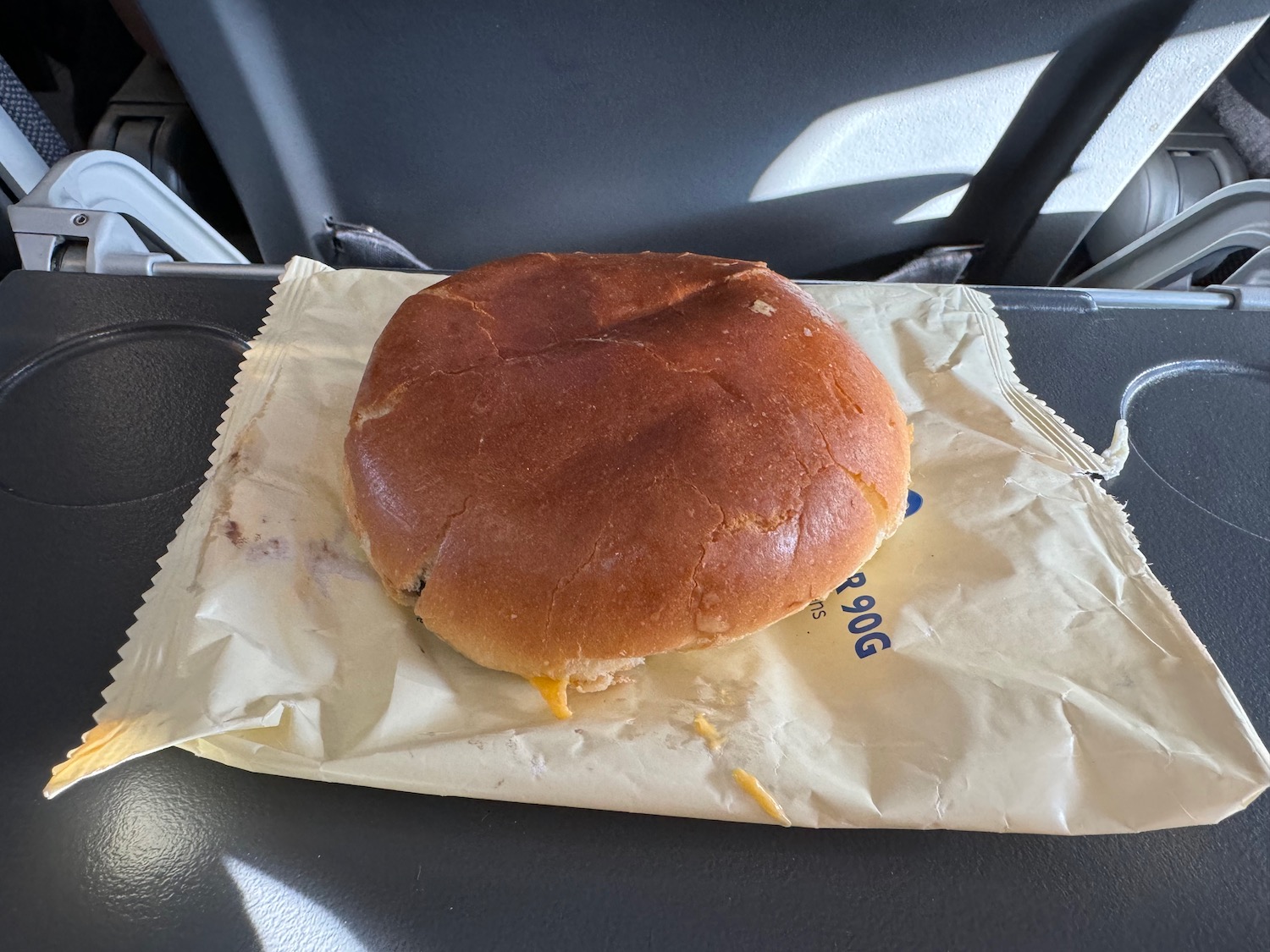 a burger on a paper wrapper