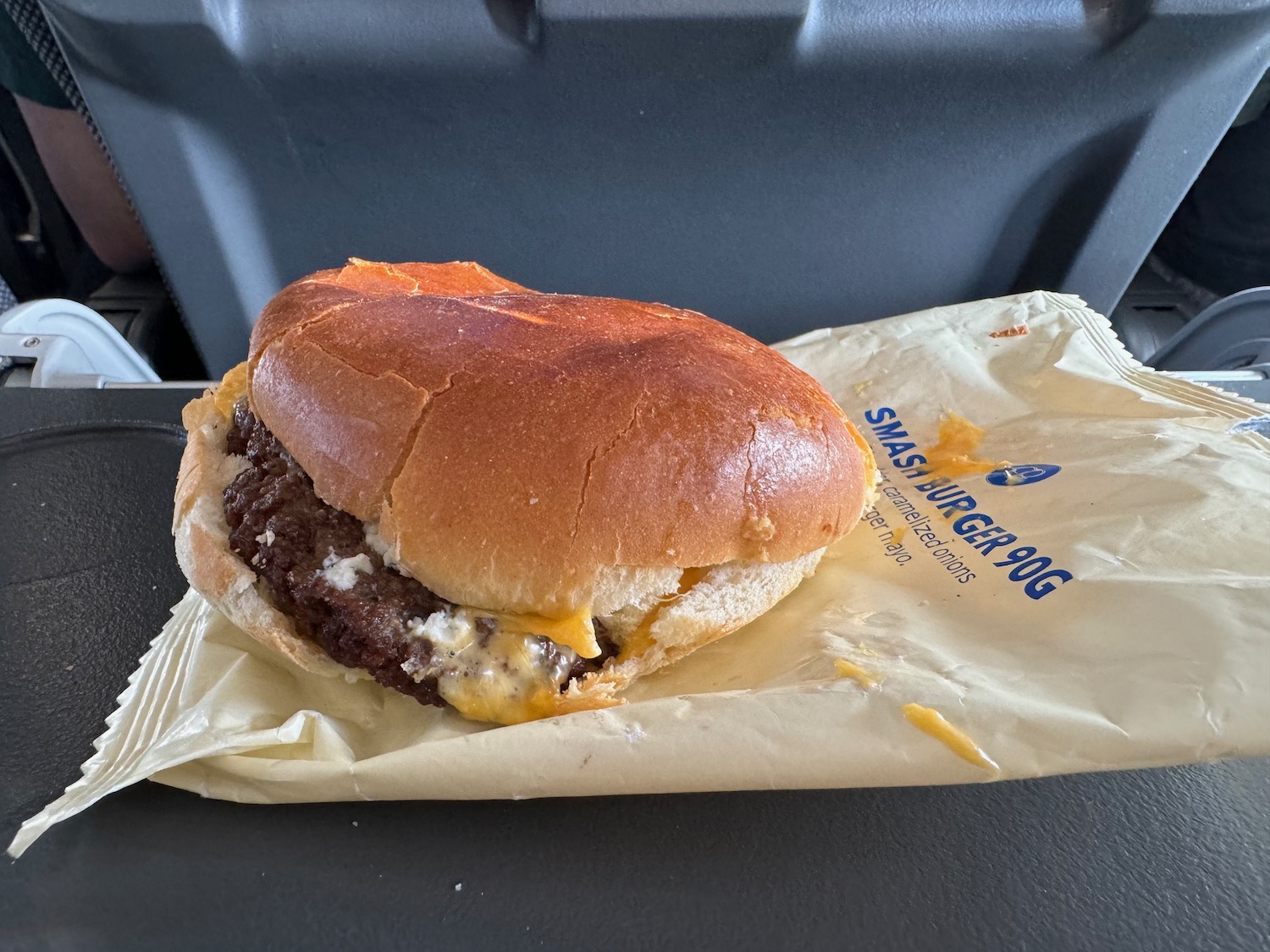 a burger on a paper wrapper