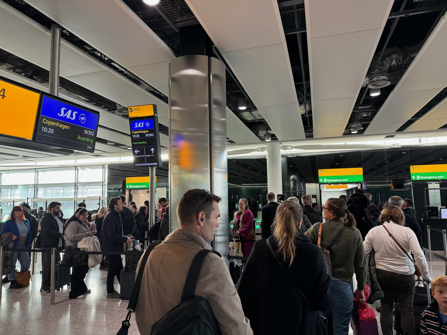 a group of people in an airport