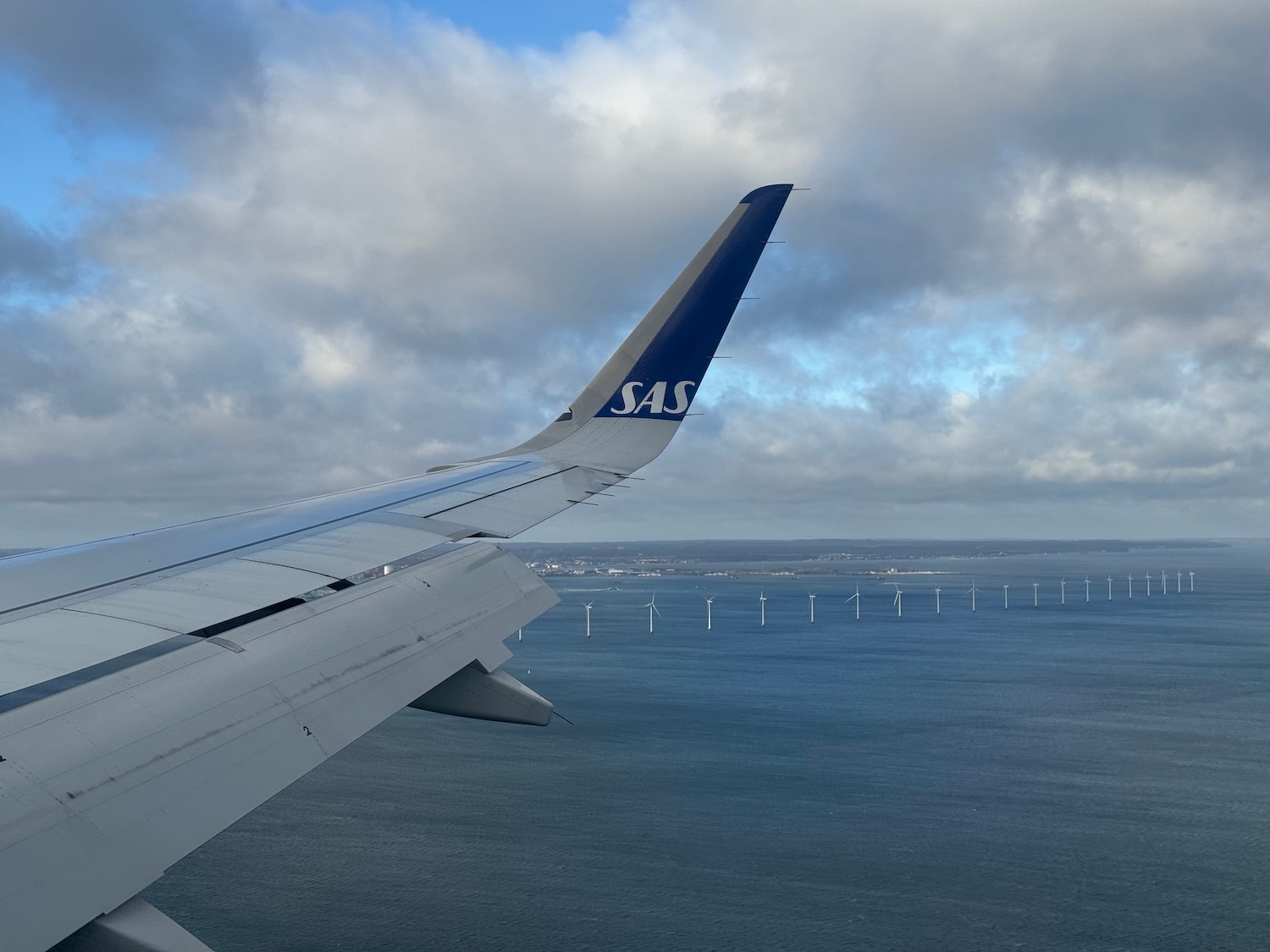 an airplane wing over water