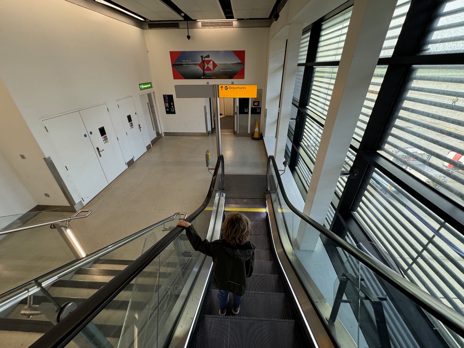 a child on an escalator