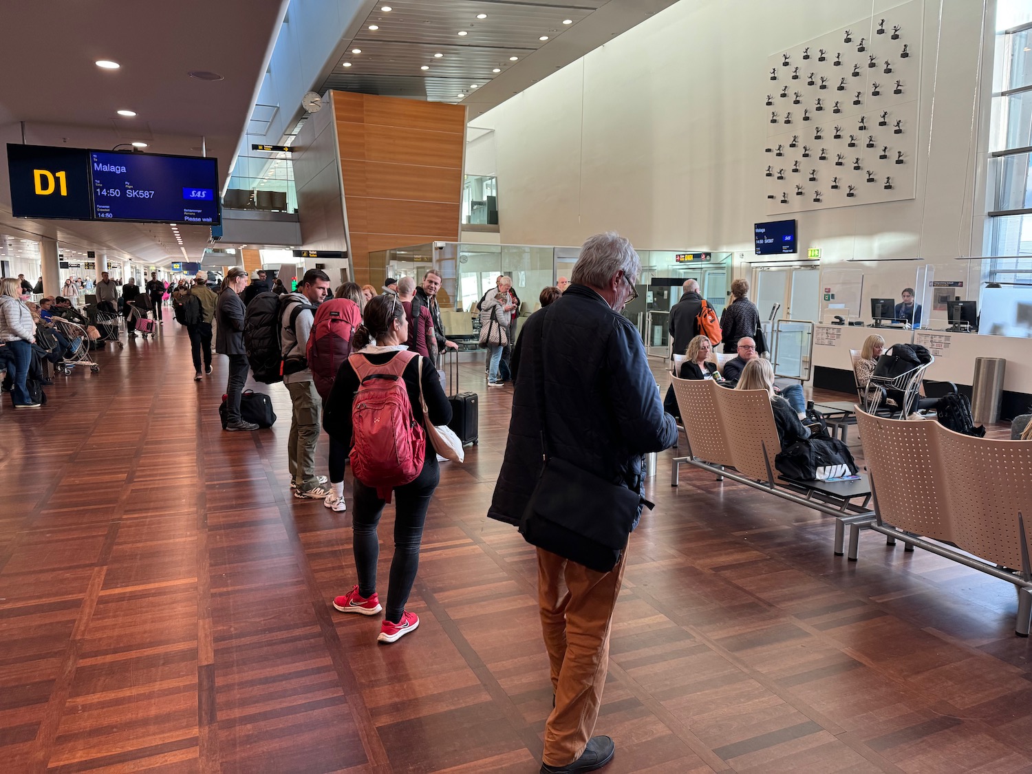 a group of people in a terminal