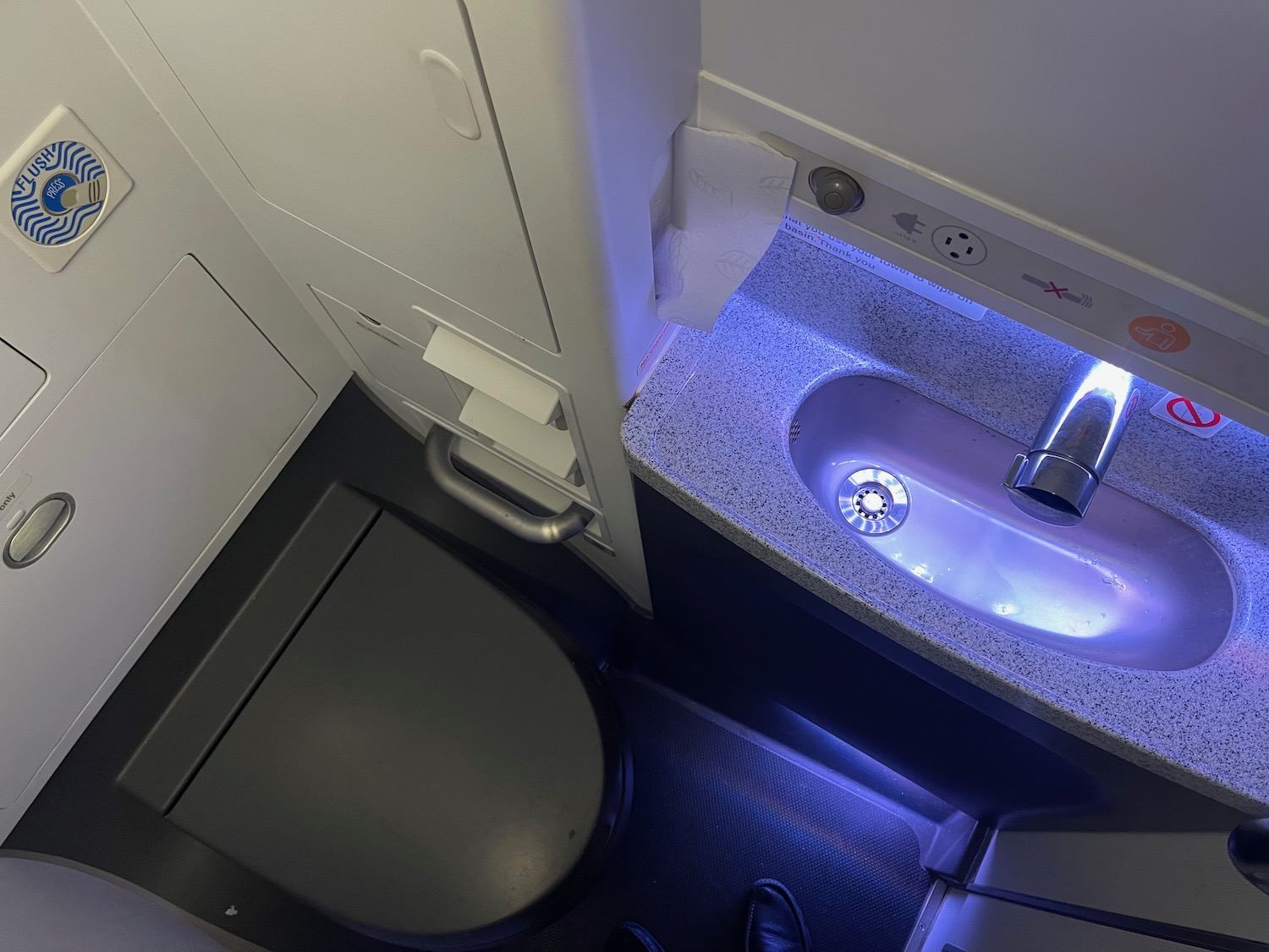 a sink and toilet in a bathroom