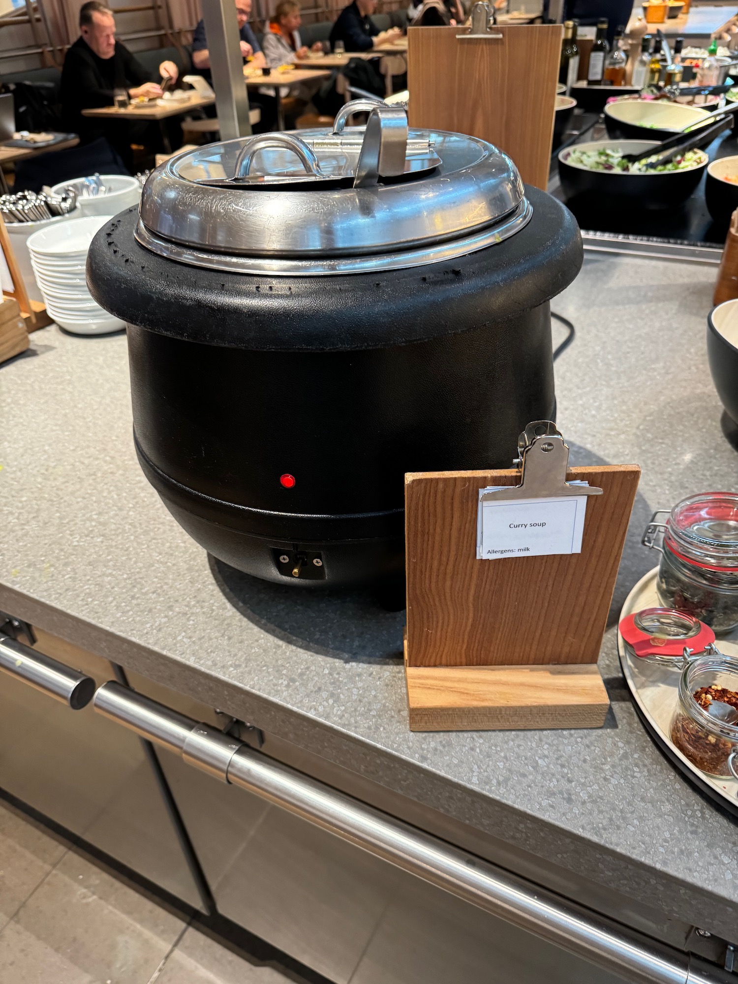 a black pot on a counter