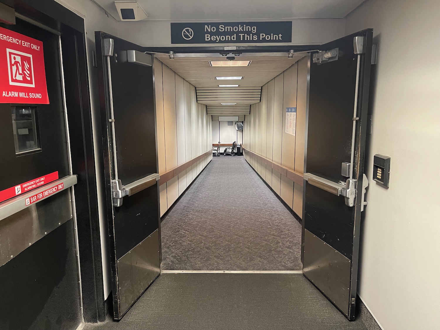 a hallway with double doors