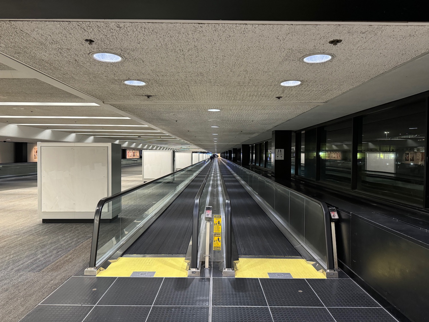 a moving walkway in a building