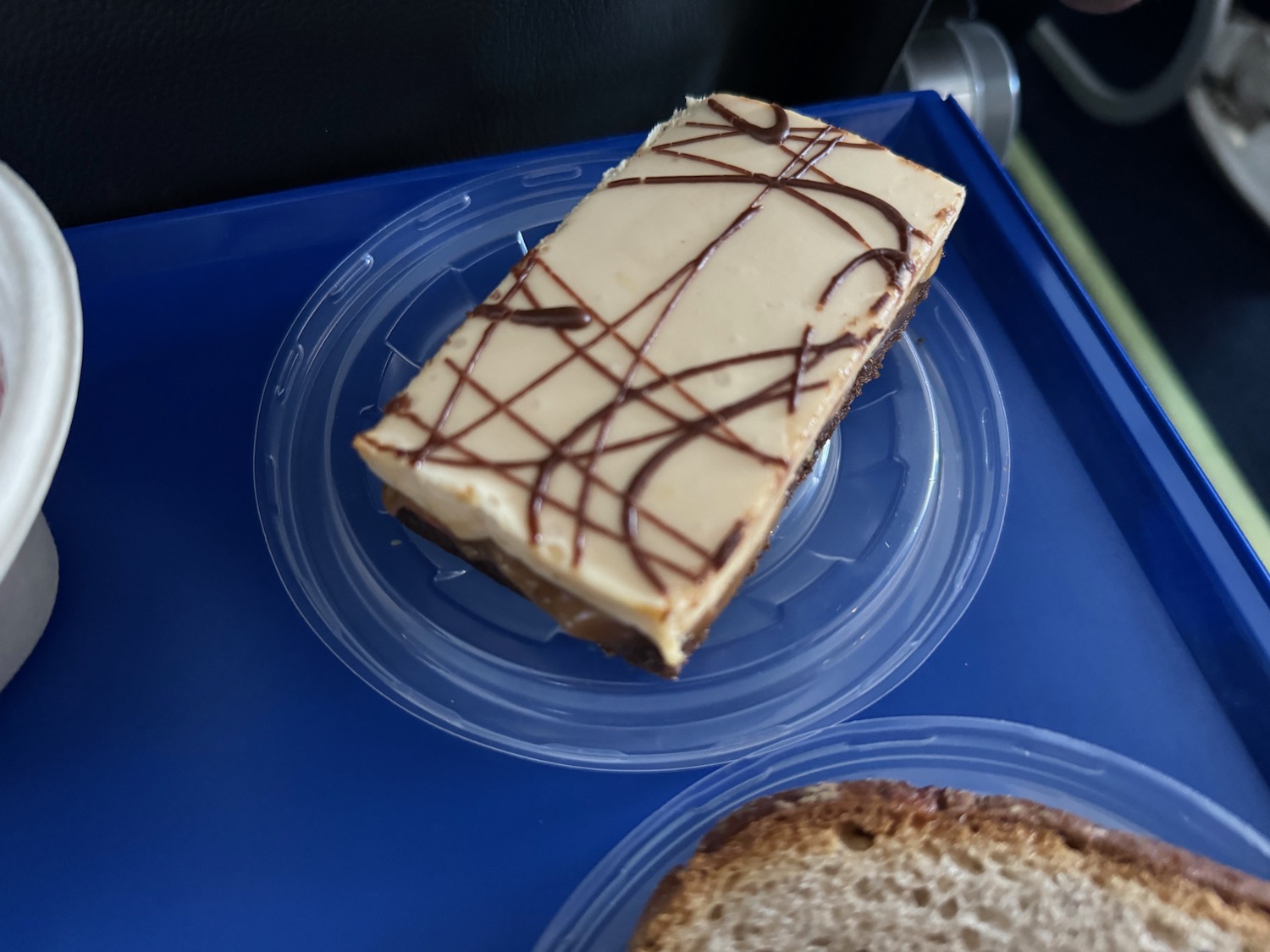 a piece of cake on a plastic plate