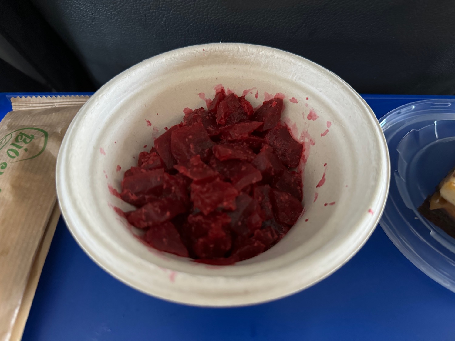 a bowl of food on a blue surface