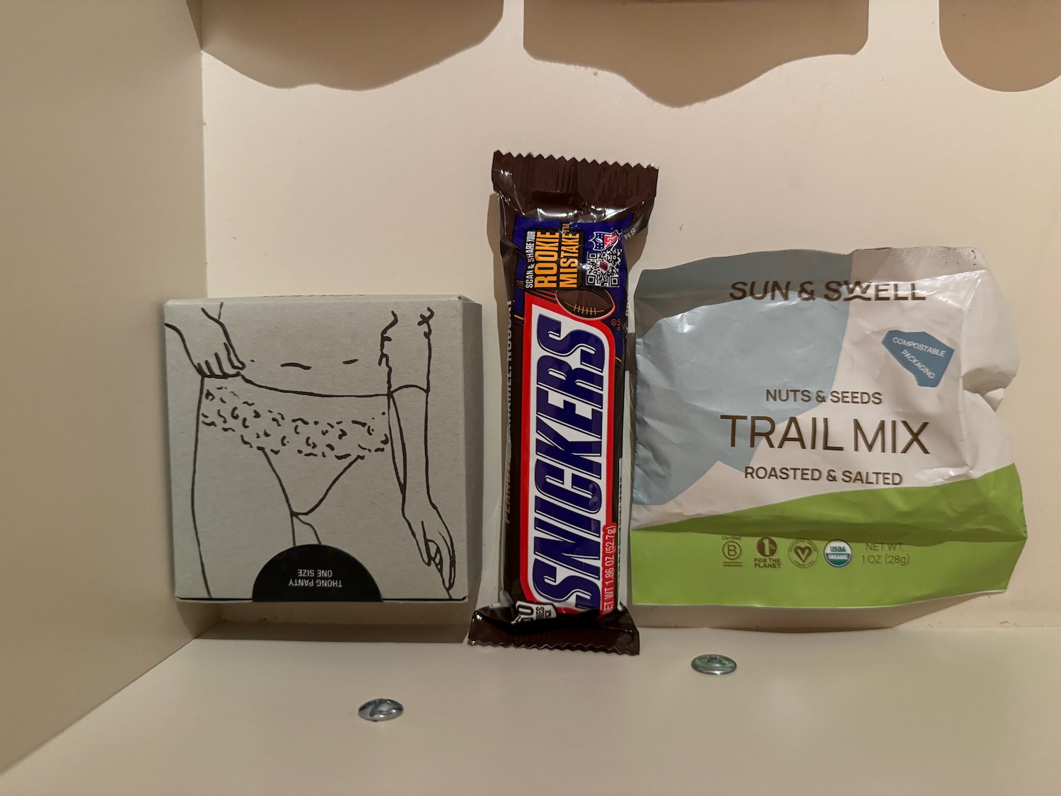 a box of candy and a package of chocolate