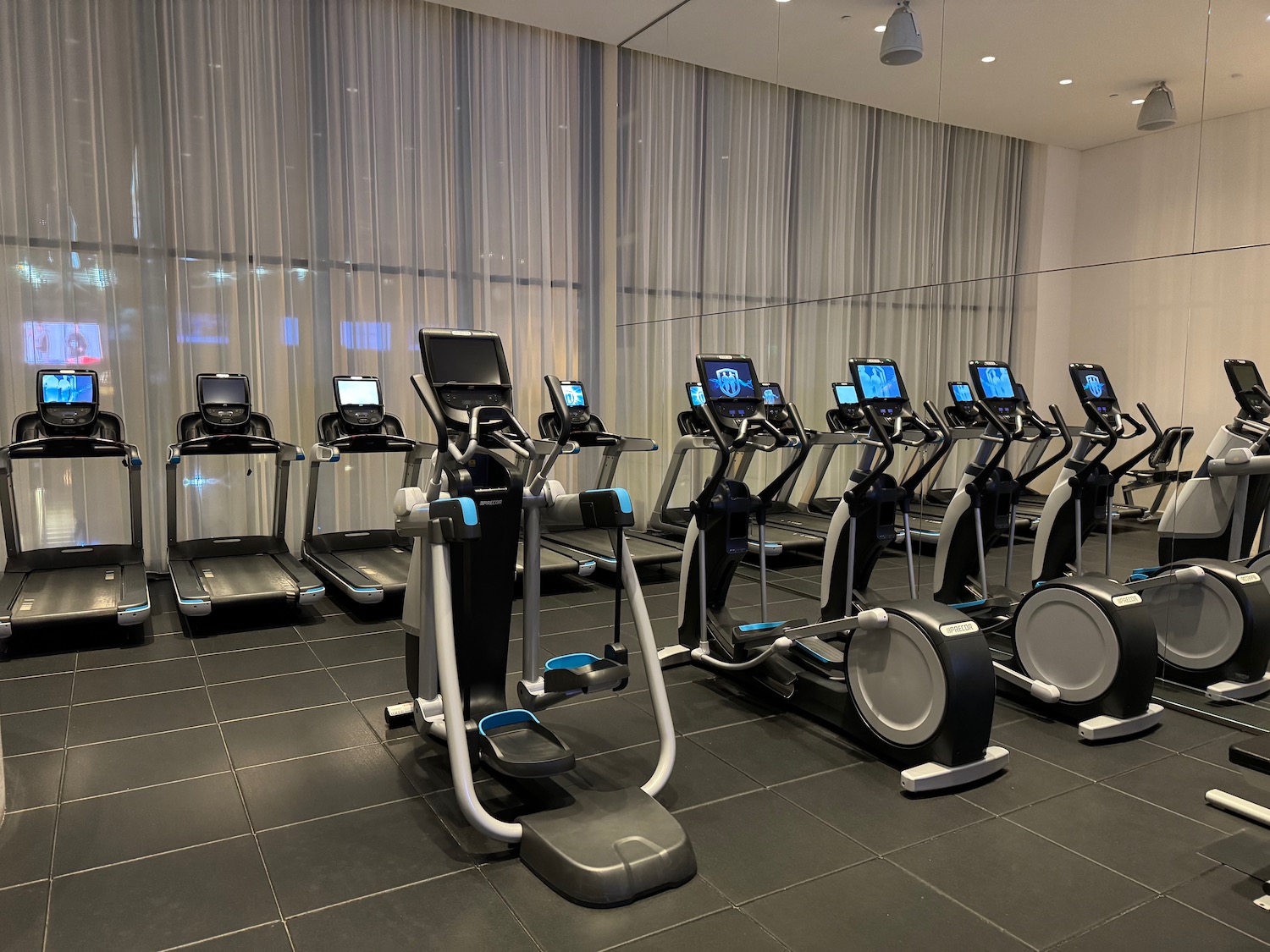 a group of treadmills in a room