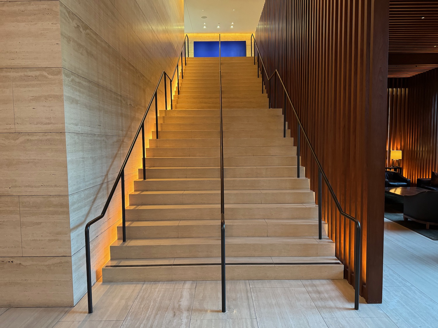 a staircase with handrails in a building