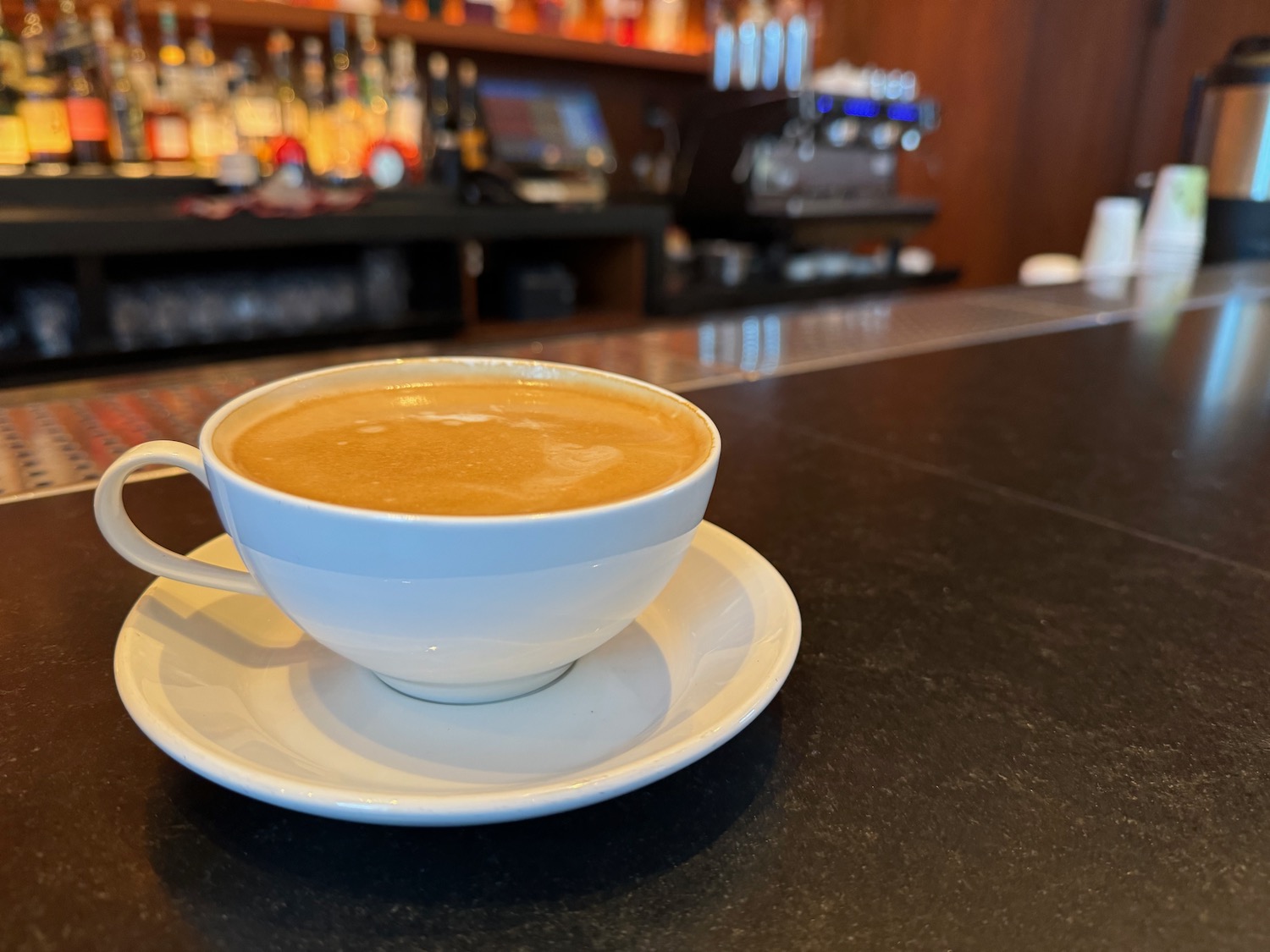 a cup of coffee on a counter