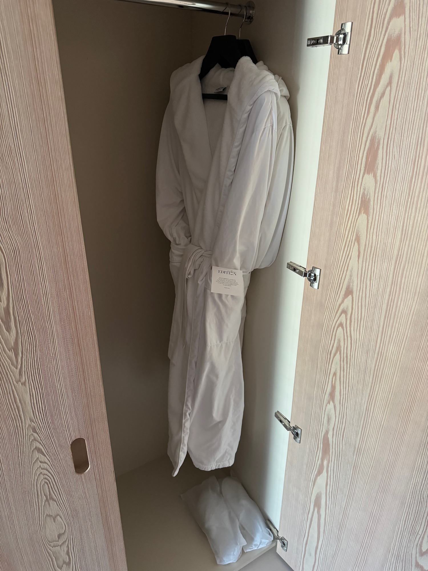 a white robe in a closet