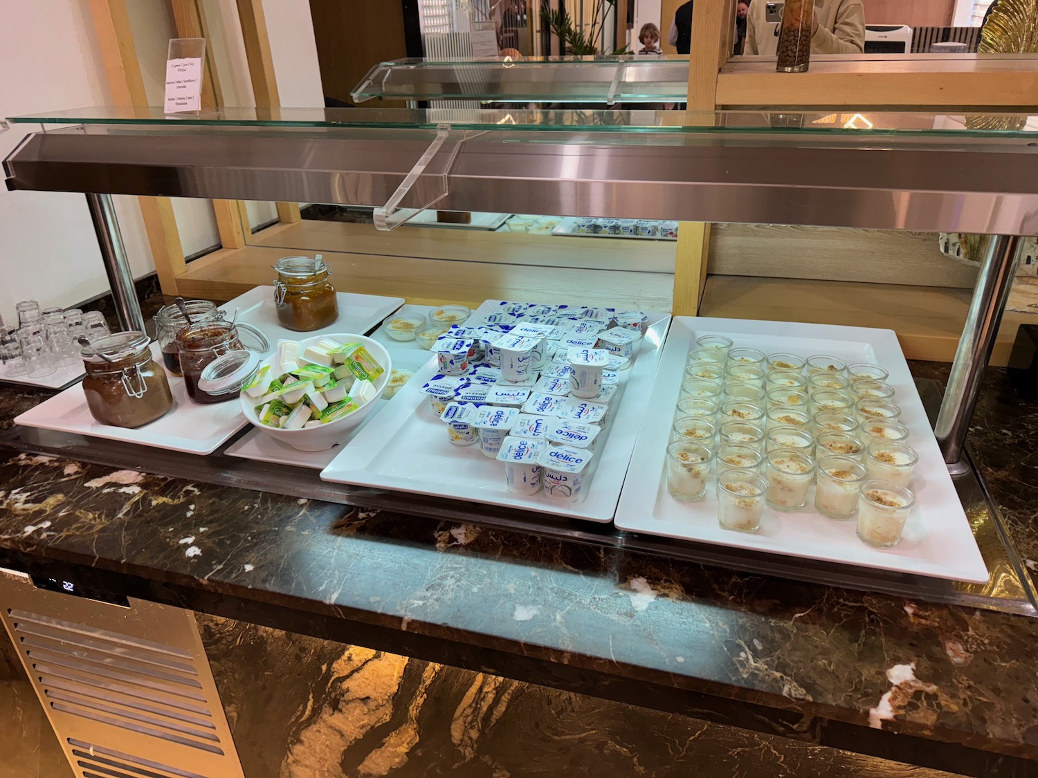 a buffet with different food items on it