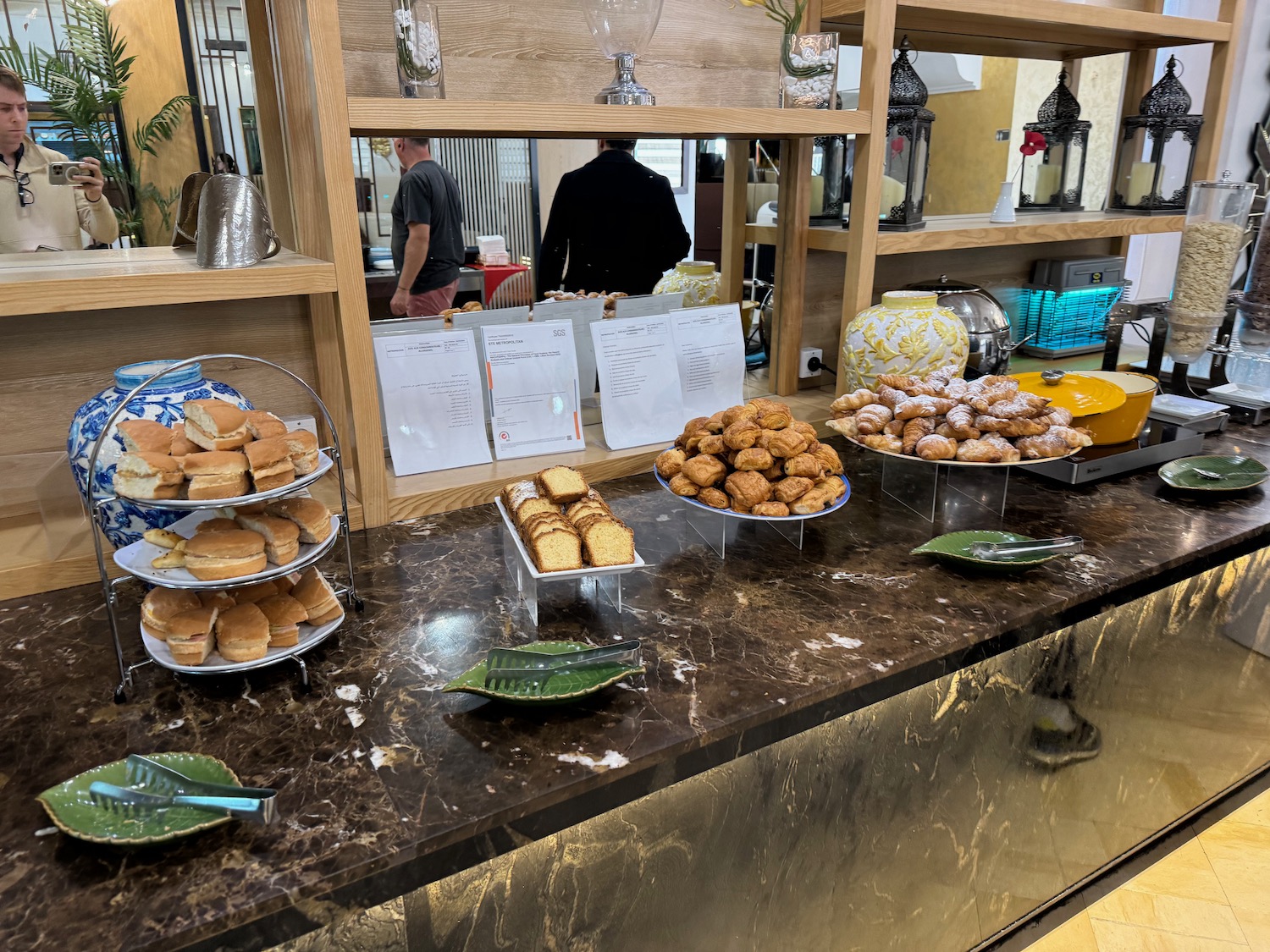 a buffet table with food on plates