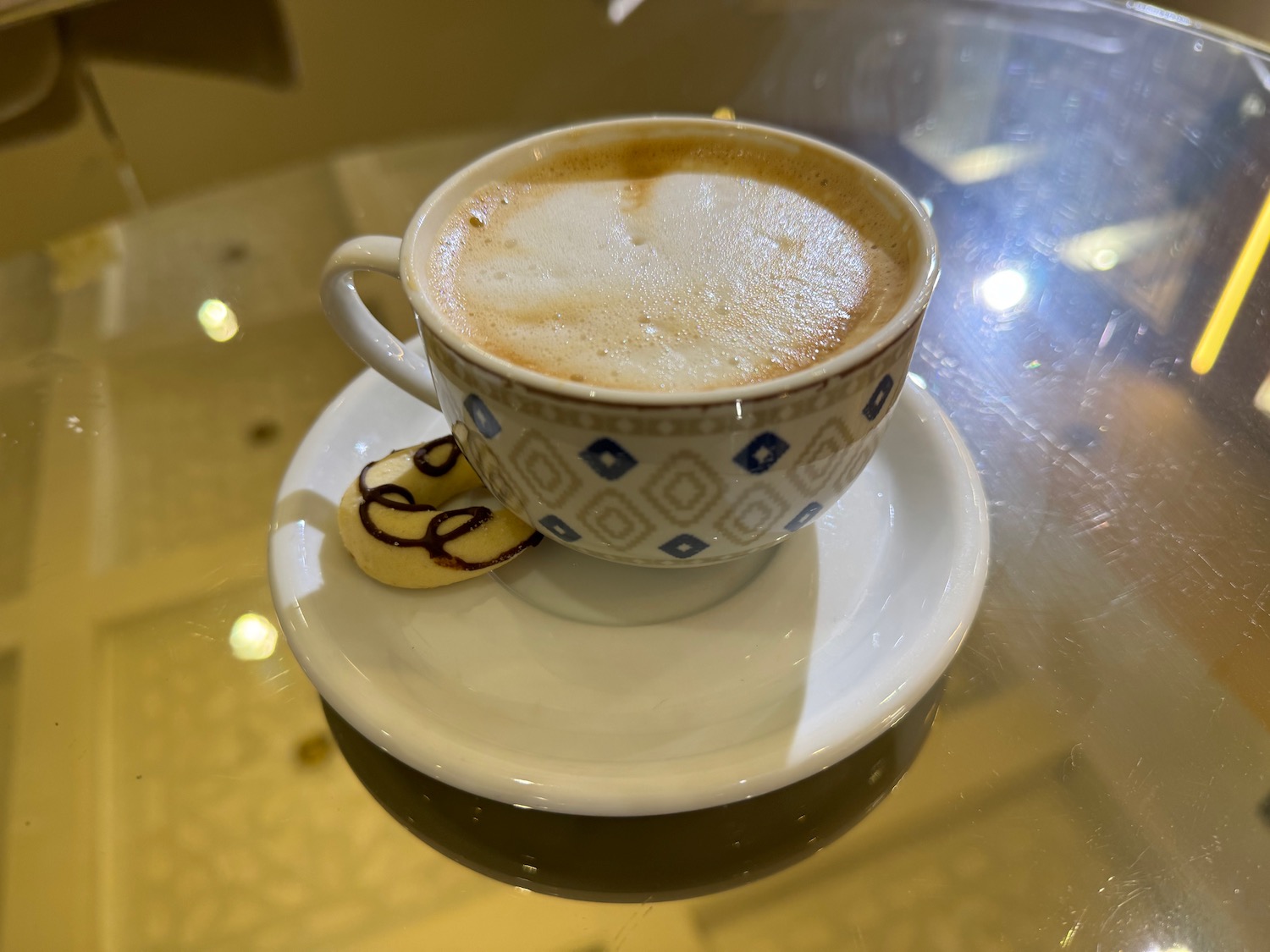 a cup of coffee on a saucer