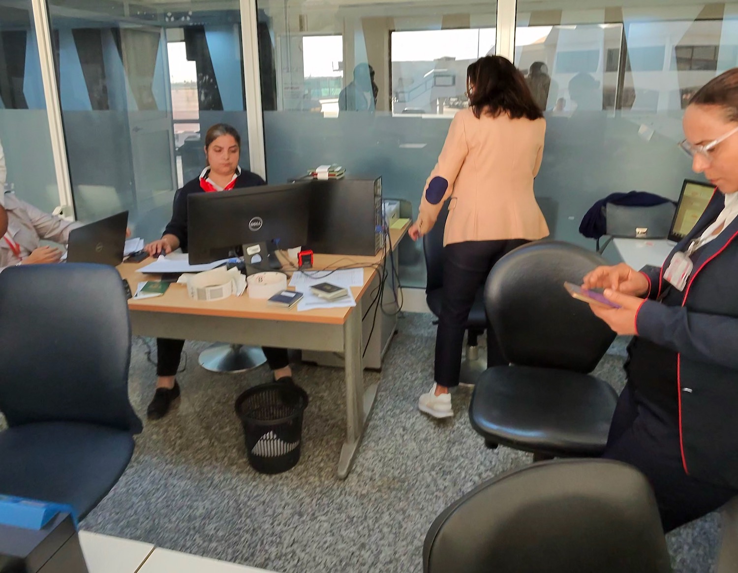 a group of people in an office