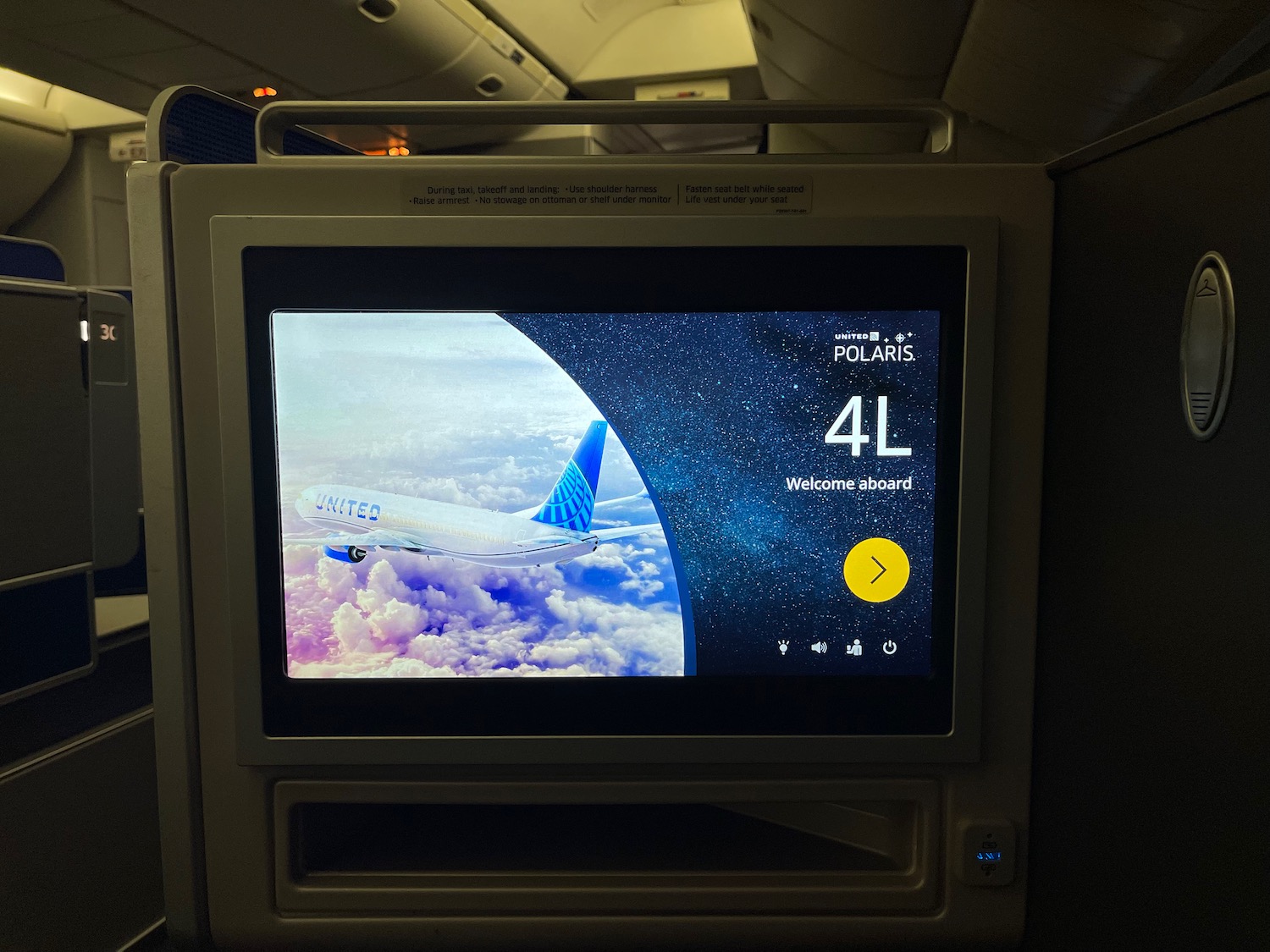 a screen on an airplane