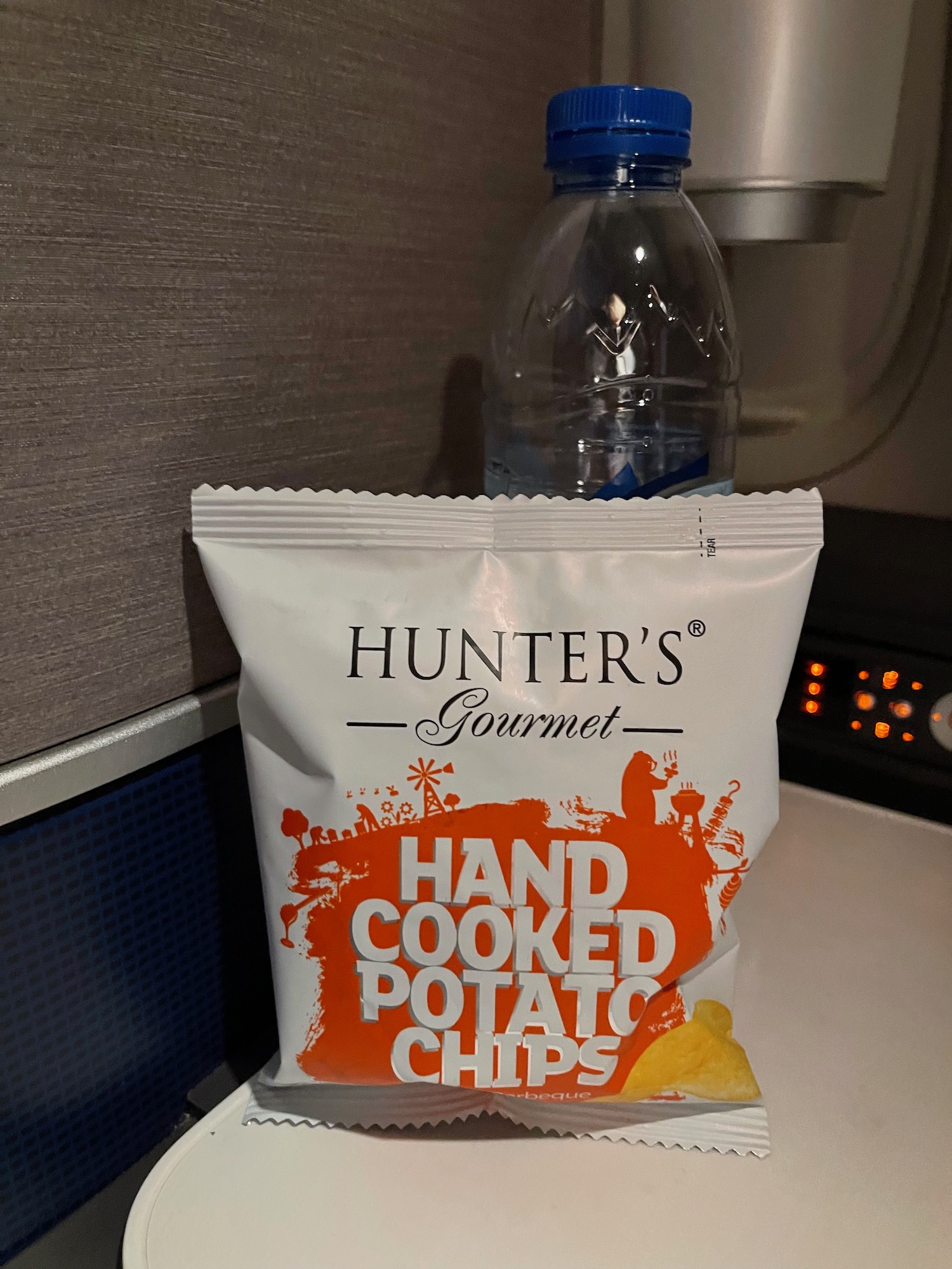 a bag of chips and a bottle of water