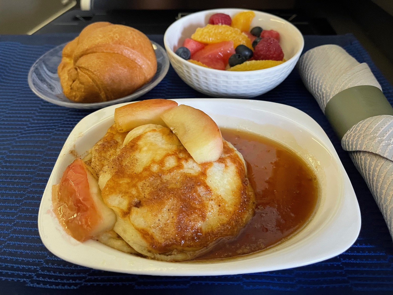 a plate of food and fruit